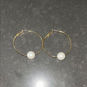 Gold tone pearl hoops